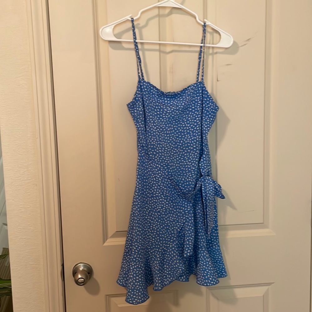 Blue and white speckled wrap sundress